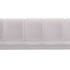 A weekly pill box in translucent white plastic with compartments labeled for each day of the week.