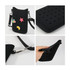 A black silicone phone bag with holes and colourful decorative charms, including a fruit and a starfish.