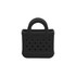 A mini black EVA holes bag charm with a textured finish and handle, featuring multiple perforations.