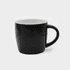 A black ceramic mug with a white interior and a sturdy handle. It has a smooth finish and a logo.