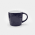 A ceramic mug in navy blue with a white interior and a rounded handle. It features a logo on the surface.
