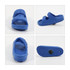 A blue clog shoe with an adjustable strap, featuring a textured sole and a logo on the side.