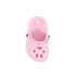 A pink clog shoe-shaped charm featuring ventilation holes and a black button detail.
