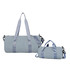 A light blue bucket duffle bag featuring wide straps, with a larger and smaller size displayed. Includes a logo.