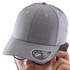 A grey cap with a checkered pattern, featuring a branded tag on the visor.