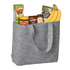 A grey felt shopper bag containing bananas, Tim Tams, Vegemite, Shapes, and sea salt. The bag has sturdy handles and a logo.