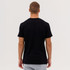 A man wearing a black Everyday Tee, viewed from the back, with grey shorts. The tee has a logo on it.
