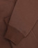 A brown unisex premium fleece oversized hoodie with ribbed cuffs and a soft finish. It features a logo.