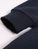 A close-up view of a navy fleece half zip work sweatshirt, showcasing the ribbed cuff detail and soft fabric.
