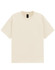 A unisex heavy cotton oversized tee in a cream colour. The shirt features a logo on the label.