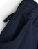 Navy blue DWR water repellent flexi work pants with elastic waistband and adjustable ties, featuring side pockets.