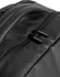 A close-up view of a black PU backpack featuring a zippered pocket and a sleek design. The backpack has a logo.