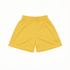 A pair of yellow youth core shorts with an elastic waistband and a plain design. Features a logo.