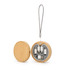 A round wooden wireless charger set in natural bamboo colour, containing various charging cables and a strap.