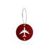 A round red luggage tag featuring a white airplane design, attached with a metal wire.