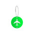 A green, round luggage tag with a silver wire and an airplane design cutout on it. It features a logo.