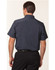 A navy short sleeve shirt for men featuring a collar and a logo on the back.