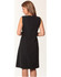 A woman's black shift dress featuring a sleeveless design and a smooth back. The dress has a simple, elegant silhouette.