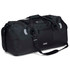 A black duffle bag with grey reflective accents and an adjustable shoulder strap. It features a zipped pocket on the side.