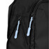 A black packing cube with blue zipper pulls, showcasing a close-up of its textured fabric and zippers.