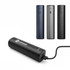 A power bank in black, grey, and navy blue, featuring a logo and a USB cable connected for charging.