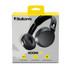 A black pair of wireless headphones in a packaging box featuring a logo and a yellow hanging tag.