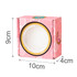 A pink custom gift box with a round window, measuring 9cm high, 10cm wide, and 4cm deep, featuring playful designs.