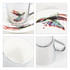 A ceramic coffee mug with a vibrant bird design and a sleek mirror-like finish, accompanied by a matching saucer.