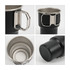 A stainless steel camping mug in black, featuring a sturdy handle and a smooth interior design.