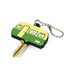 A green and yellow PVC key cover shaped like a caravan, attached to a ball chain.
