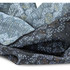 A patterned fabric headband in shades of blue and black, featuring geometric designs. It has a soft texture.