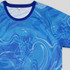 A blue active t-shirt featuring a swirling wave pattern and a contrasting collar, with a tag indicating size M.