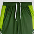 Green active pants with bright green accents, featuring a white drawstring and a logo. Ideal for sports or workouts.