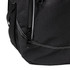 A black backpack featuring a zip closure and contrasting white stitching. It has a branding logo on the side.
