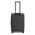 A medium-sized suitcase in matte black, featuring a retractable handle and wheels for easy mobility.
