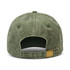 A vintage washed cap in olive green, featuring an adjustable strap and a discreet logo on the back.