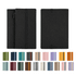 A black soft-touch PU leather notebook with a zippered pocket, available in various colour options. Features a logo.