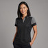 A black polo shirt with grey accents, featuring a collared neckline and short sleeves, worn by a smiling woman.