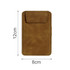 A brown mini clipboard with a flap, measuring 12 cm by 8 cm, featuring visible stitching and a logo.