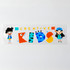 A vibrant sticker featuring colourful characters and the text "CREATIVE KIDS" in playful fonts. It has a glossy finish.