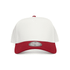A two-tone cap featuring a white front and a red visor. The cap has a logo on the front panel.