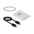 A power bank with a metallic ring, a user manual, and a black USB-C charging cable.