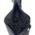 An open black satchel bag with a smooth interior lining and a zippered pocket. It features a zippered closure and has a logo.
