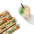 A drink bottle with a colourful paper straw alongside a bundle of decorative 4-ply straight angled paper straws.