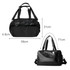A black duffle bag with two handles, a removable shoulder strap, and a zippered opening. Features a logo.