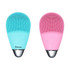 A silicone facial cleansing brush in turquoise and pink, featuring a silver base and buttons for operation.