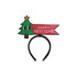 A black headband featuring a cartoon Christmas tree and a red banner with a festive message.