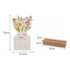 A desk calendar featuring a floral design with vibrant colours, accompanied by a wooden stand.
