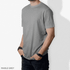 A marle grey t-shirt displayed on a male model, featuring a casual fit and short sleeves. It has a logo.