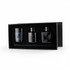 Aroma diffuser and candle gift box featuring a blue candle and two black diffuser bottles, all in a sleek black box with branding.